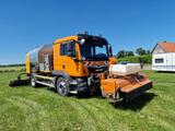 MAN 18.320 Asphalt Spritzrampe Breining Secmair - Offers