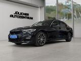 BMW 330i xDrive M-Paket Aut., Kein Wartungsstau - schwarze BMW 330