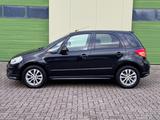 Suzuki SX4 City+ 1.6 Club/Navi./Alu/Klimaaut./SHZG - schwarze Suzuki SX4
