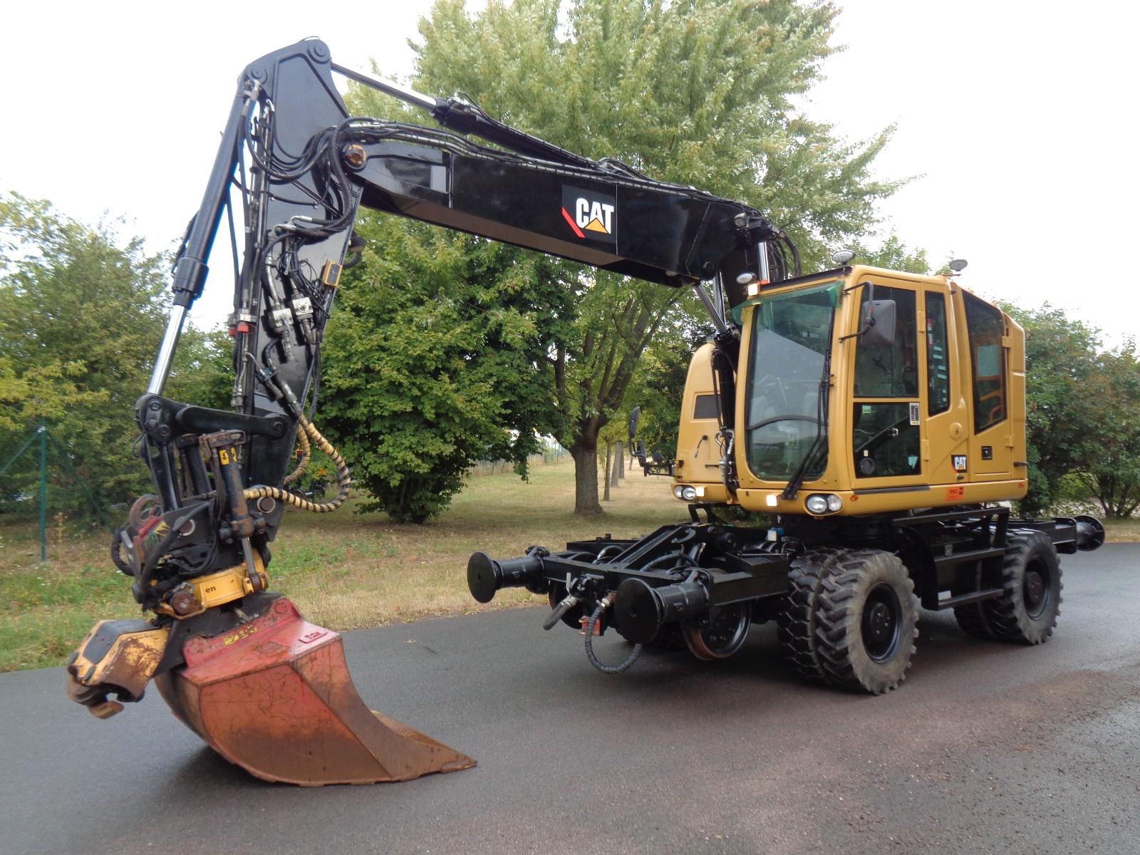 CAT M323 ZW RAIL mit Encon Tiltrotator