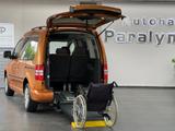 Volkswagen Caddy 1.6 TDI JAKO-O Rollstuhlgerecht-Rampe - mit Diesel-Antrieb: Orange, Van