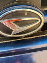 Daihatsu CUORE Corporate IdentityPizzerien - gebrauchte Daihatsu Cuore aus dem Jahr 1999