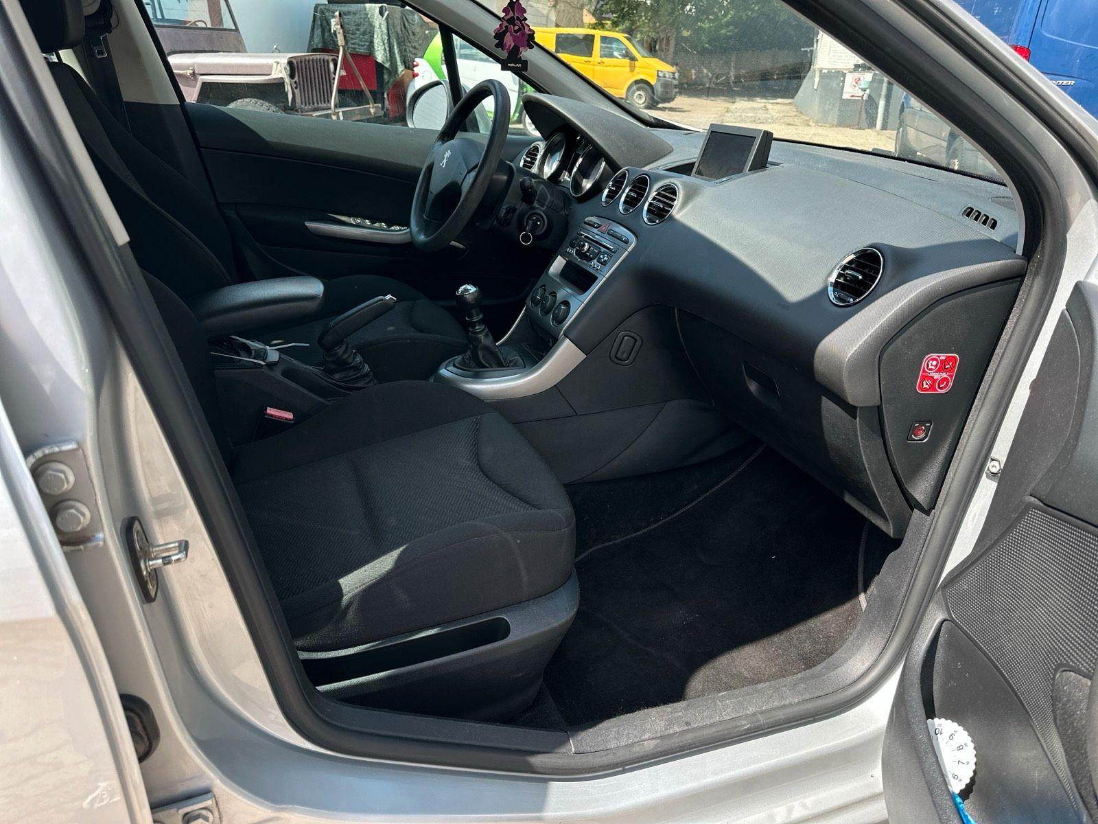 Peugeot 308 2012 — photo 12