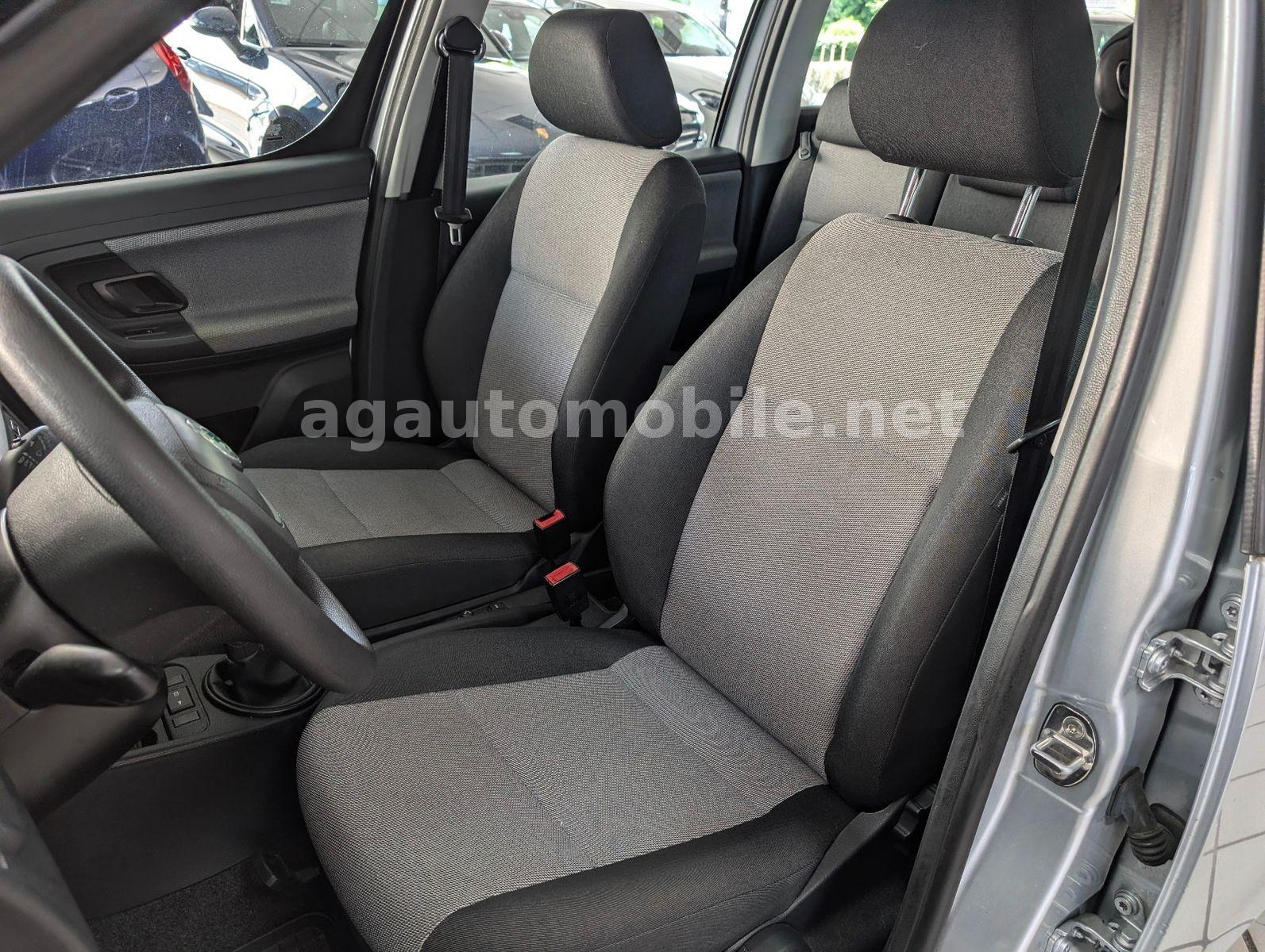 Skoda Roomster 2011 — фото 11