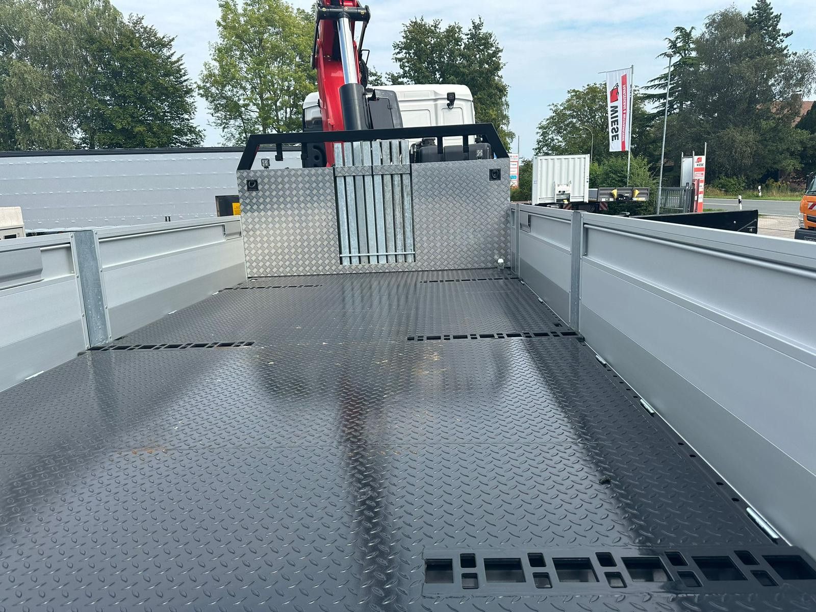 Fahrzeugabbildung MAN TGS 41.520 8x8 mit Fassi Ladekran F710RA.2.26