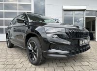 SKODA Karoq 2.0 TSI DSG 4x4 Sportline PANO AHK 5J GAR bei Autohaus Landmann & Maier OHG