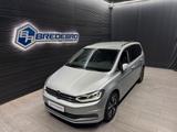 Volkswagen Touran Highline BMT/Start-Stopp - Volkswagen Touran mit Diesel-Antrieb: Geländewagen, Automatik