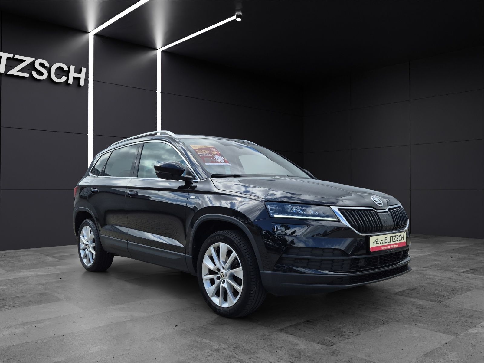 Fahrzeugabbildung SKODA Karoq TSI Clever DSG LED AHK Navi VC ACC RFK SH