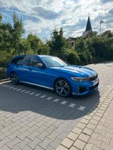 BMW M340d Individuallack., HUD, Laser, elektr. AHK, - mit Diesel-Antrieb: Elektrische Wegfahrsperre, Kombi, mit Klimaautomatik, Elektr