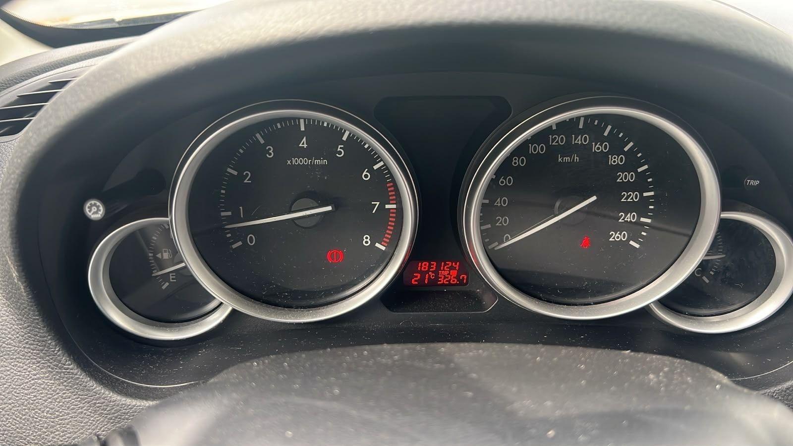 Mazda 3 2009 — engine 75 HP (55kW)