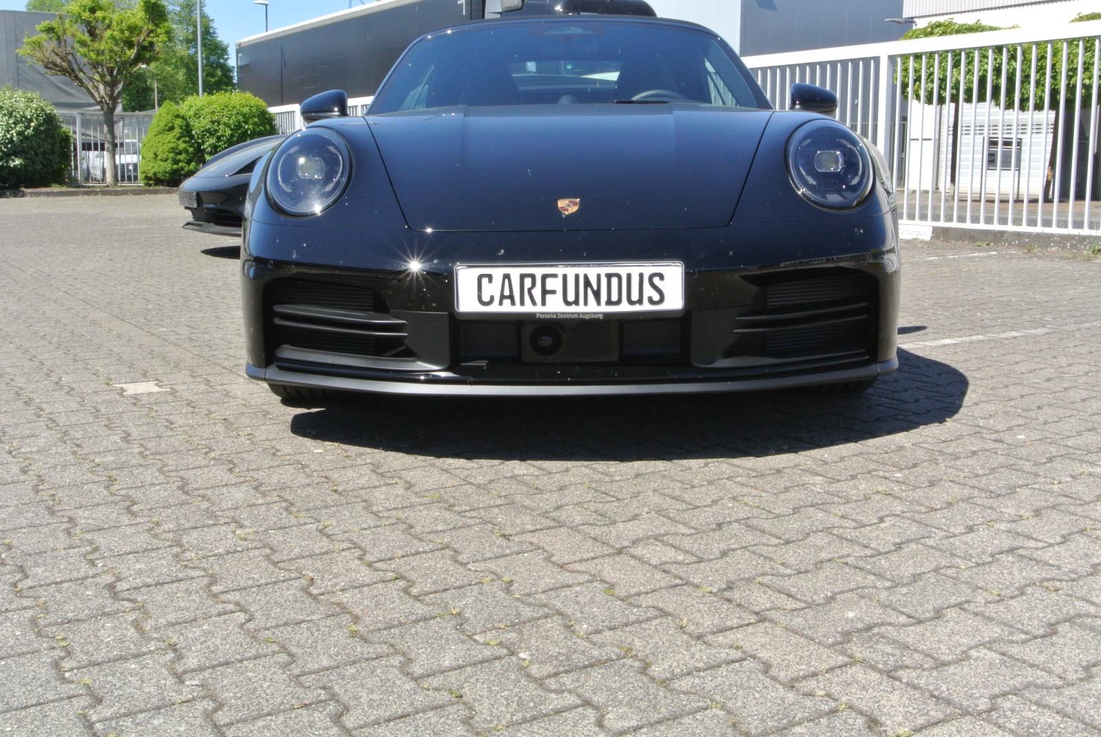 Porsche 992 cab,schw/schw,21",abgas,chrono,14 wege,bose,