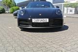 Porsche 992 cab,schw/schw,21",abgas,chrono,14 wege,bose,