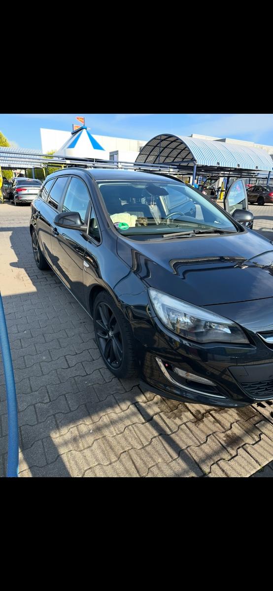 Opel Astra 2012 — engine 1.956 cm³, 165 HP (121kW)