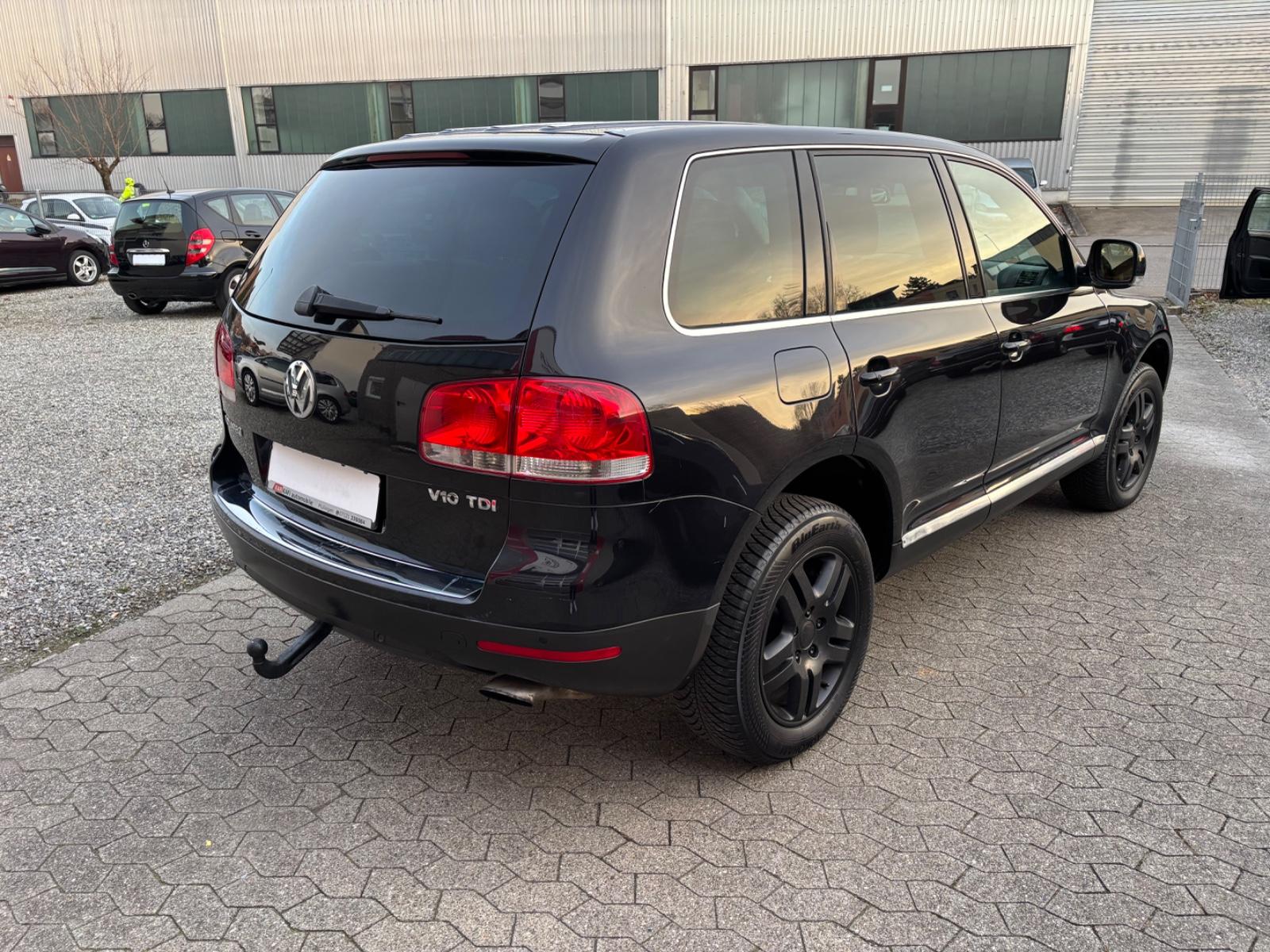Volkswagen Touareg 2005 — engine 4.921 cm³, 313 HP (230kW)