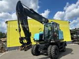 CAT M317 F mit OilQuick OQ 70/55 - CAT Radlader