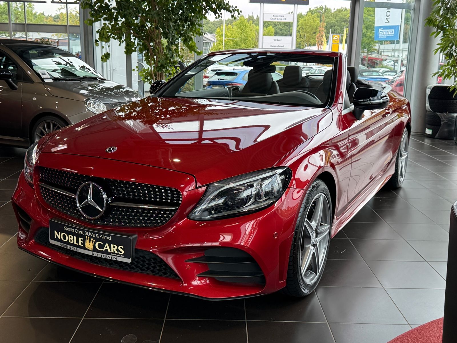 Fahrzeugabbildung Mercedes-Benz C 200 Cabrio AMG NIGHT Navi Rückfahr KAM Sounds.