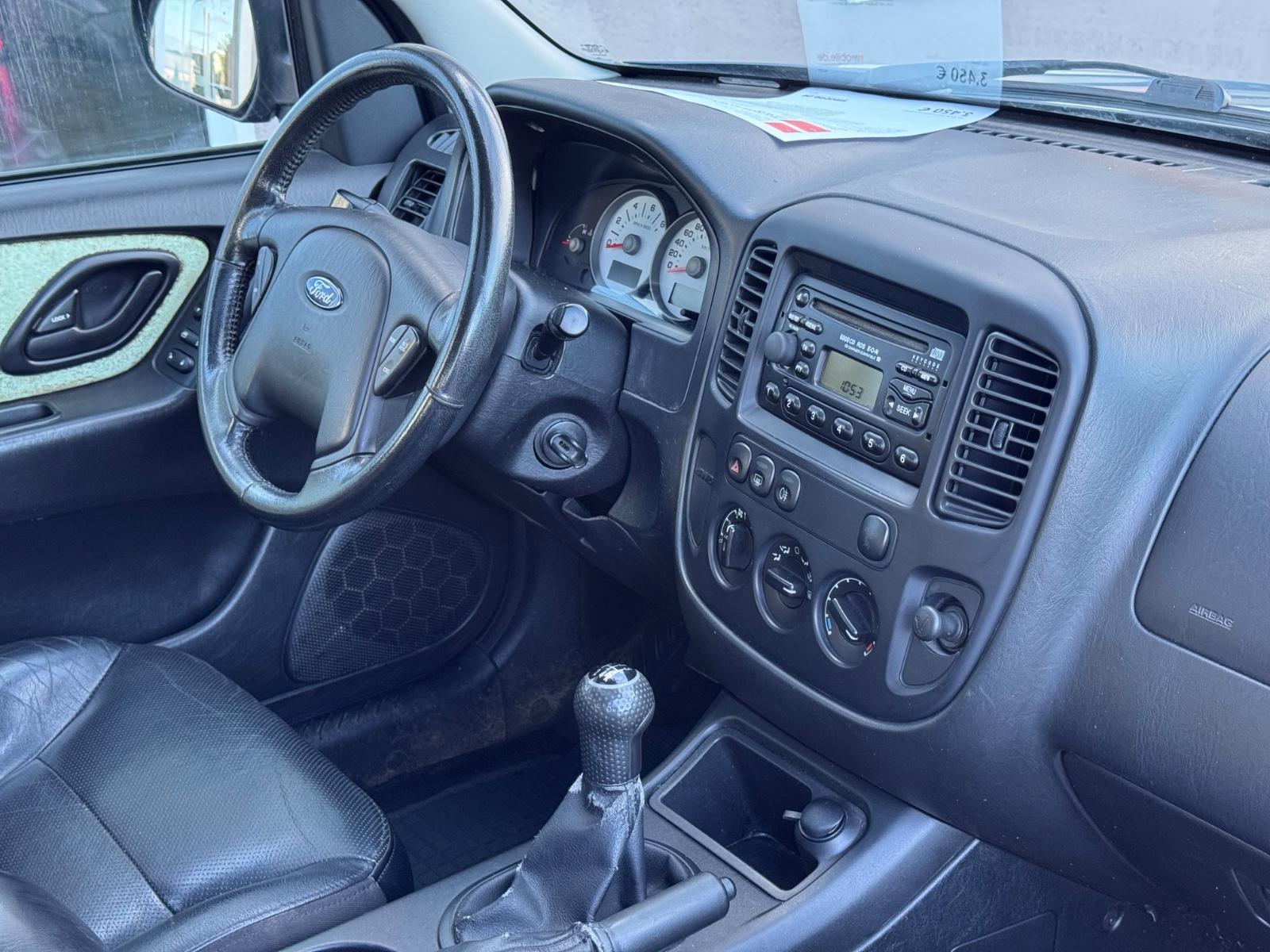 Ford Maverick 2005 — photo 19