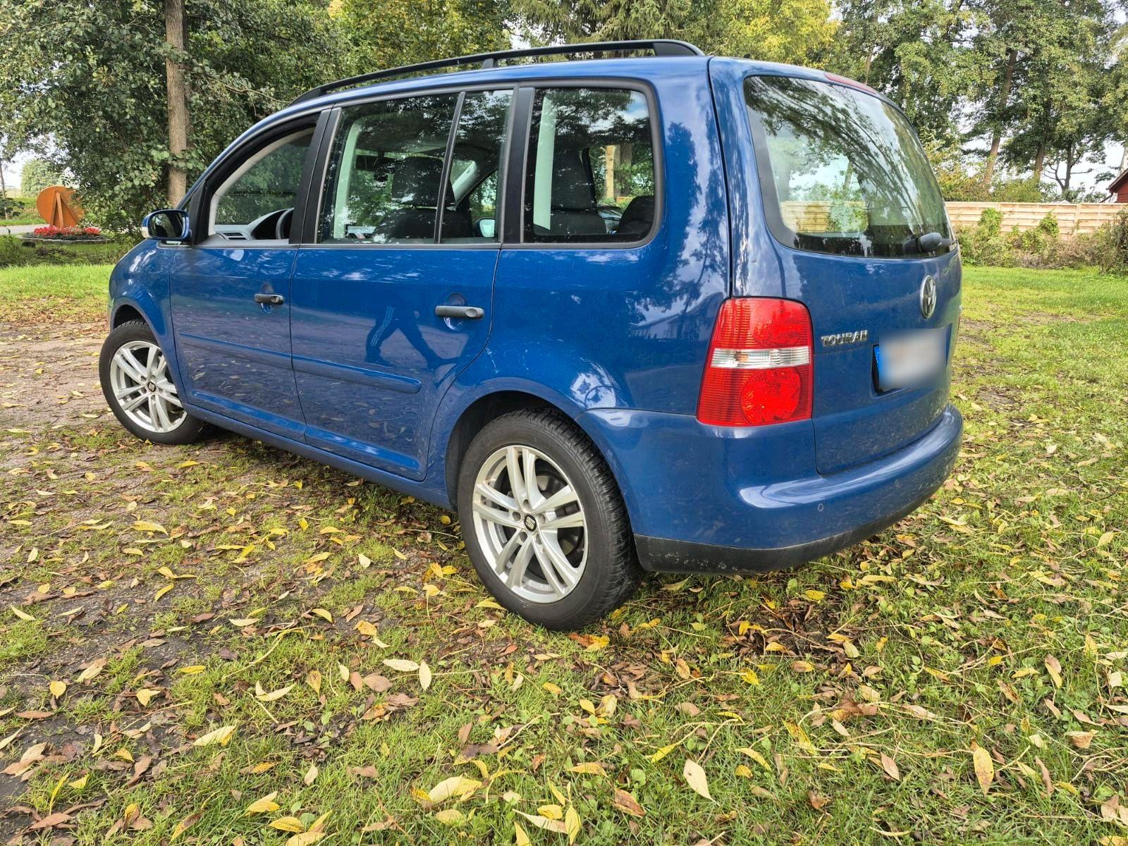 Volkswagen Touran 2006 — engine 105 HP (77kW)
