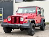 Jeep Wrangler Sport 2.5 4X4 AHK Fest/ Servo - aus 1999: Geländewagen