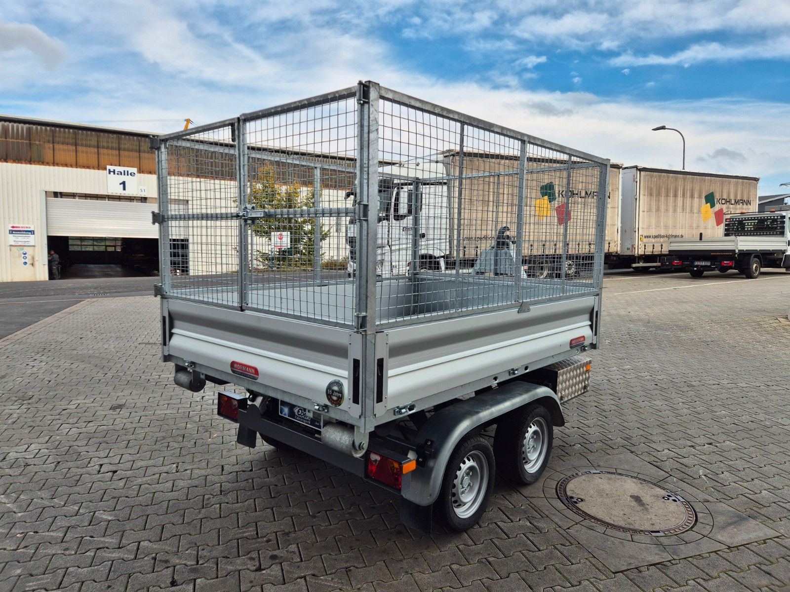 Fahrzeugabbildung Wörmann Abrollkipper Mulde Gitterbox