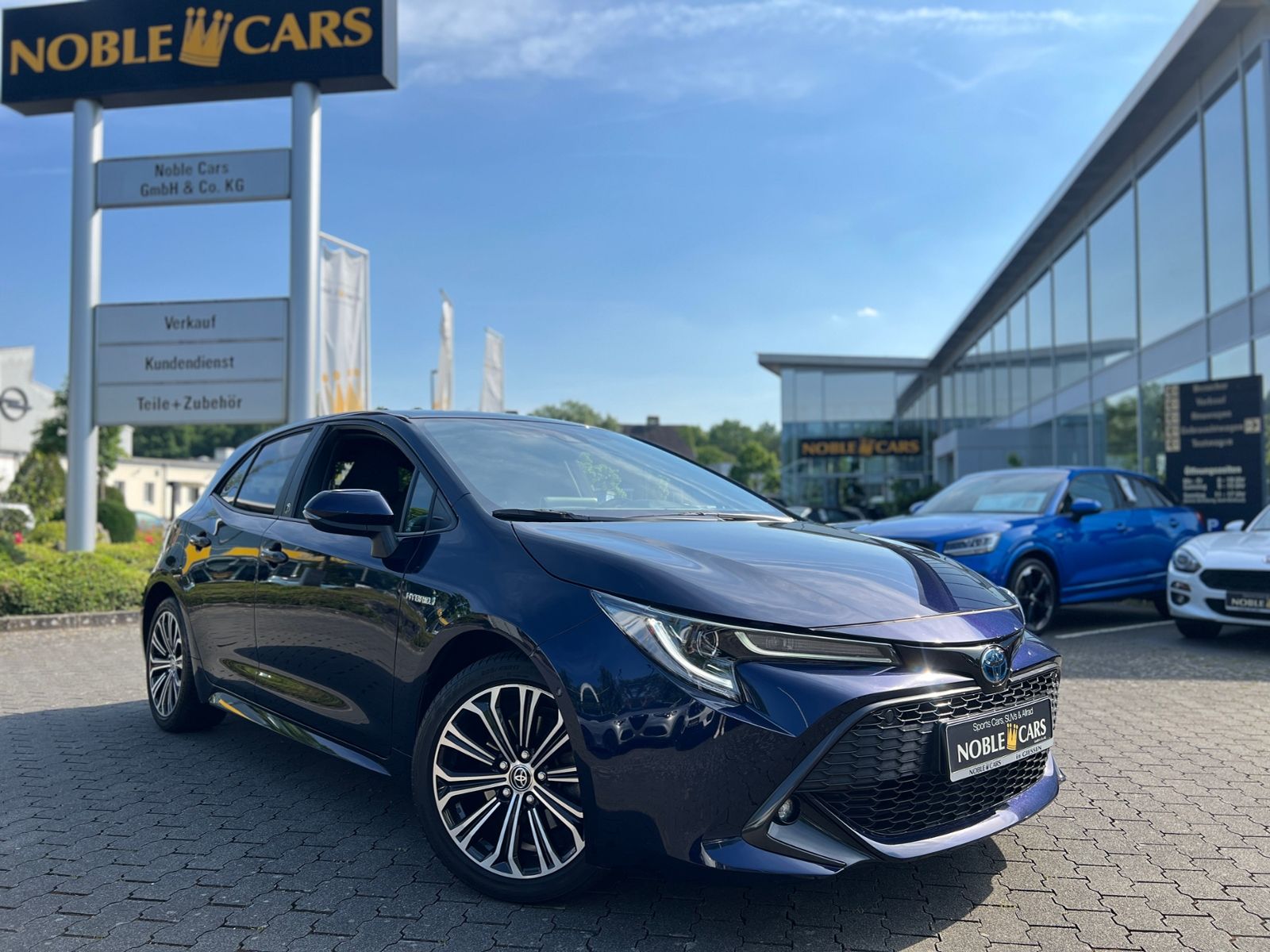 Fahrzeugabbildung Toyota Corolla 2.0 Hybrid Team D JBL LED RFK NAVI SHZ