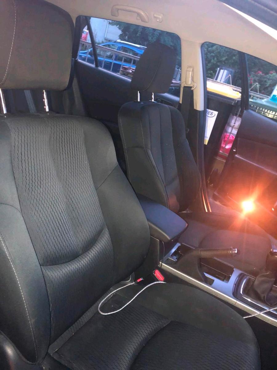 Mazda 2 2011 — вигляд ззаду