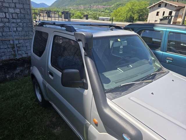 Suzuki Jimny 2004 — engine 1.328 cm³, 82 HP (60kW)