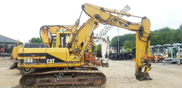 CAT 318 BL mit SW CW30 mechanisch Verstellausleger