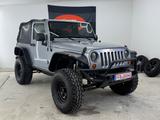 Jeep Wrangler Sahara 3.6 V6 Trail Road, höher gelegt - Jeep Wrangler: 3.6