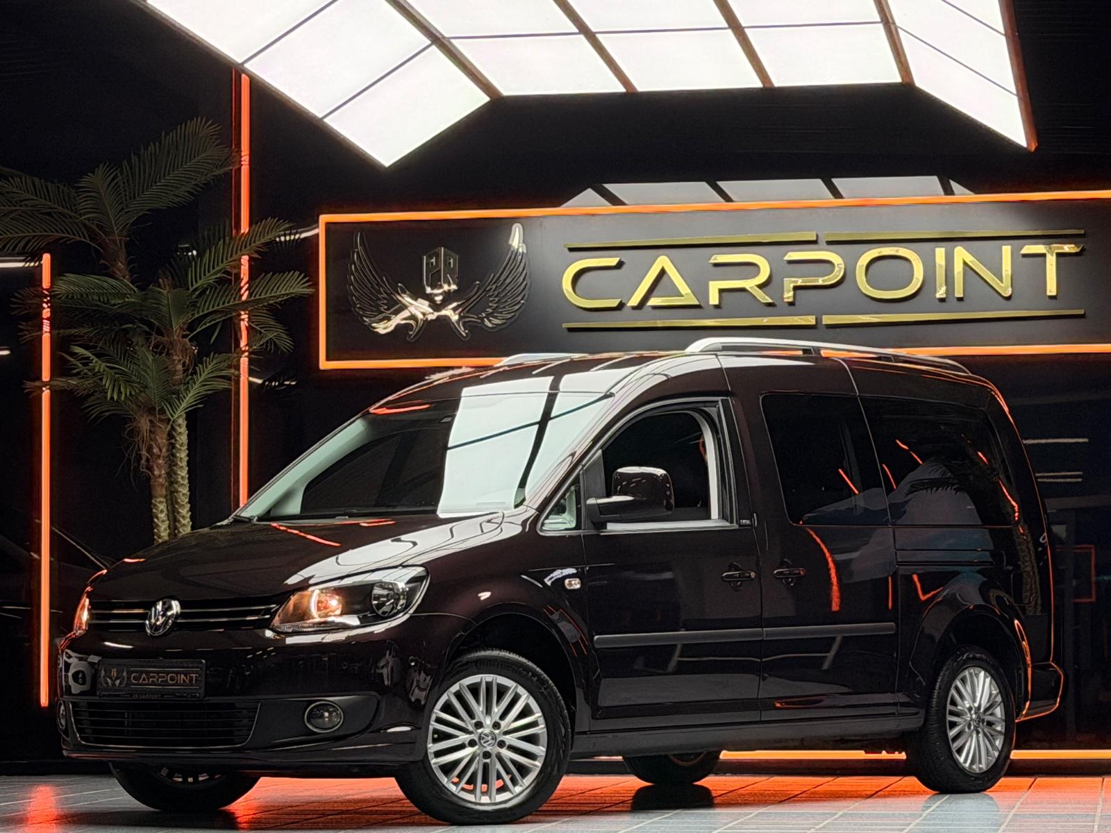 Volkswagen Caddy Maxi Kombi / Navi /7-Sitzer/Rollstuhl-Kran