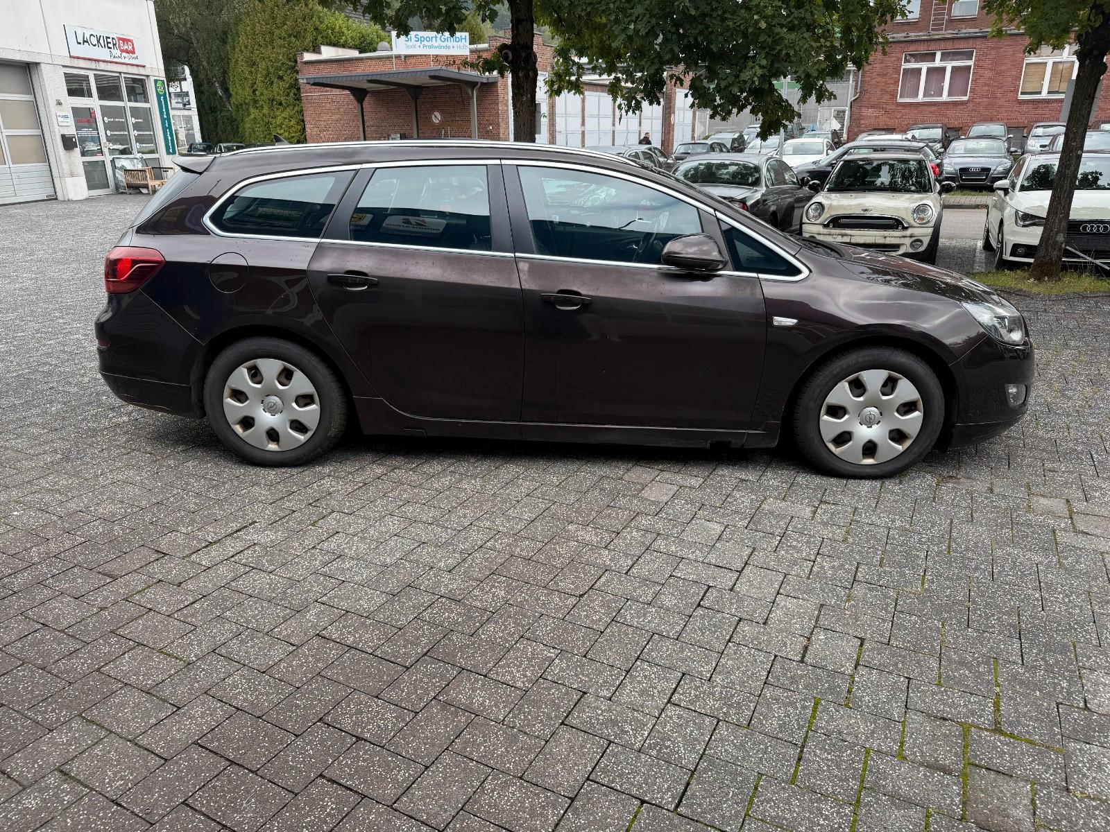 Opel Astra 2012 — engine 1.956 cm³, 165 HP (121kW)