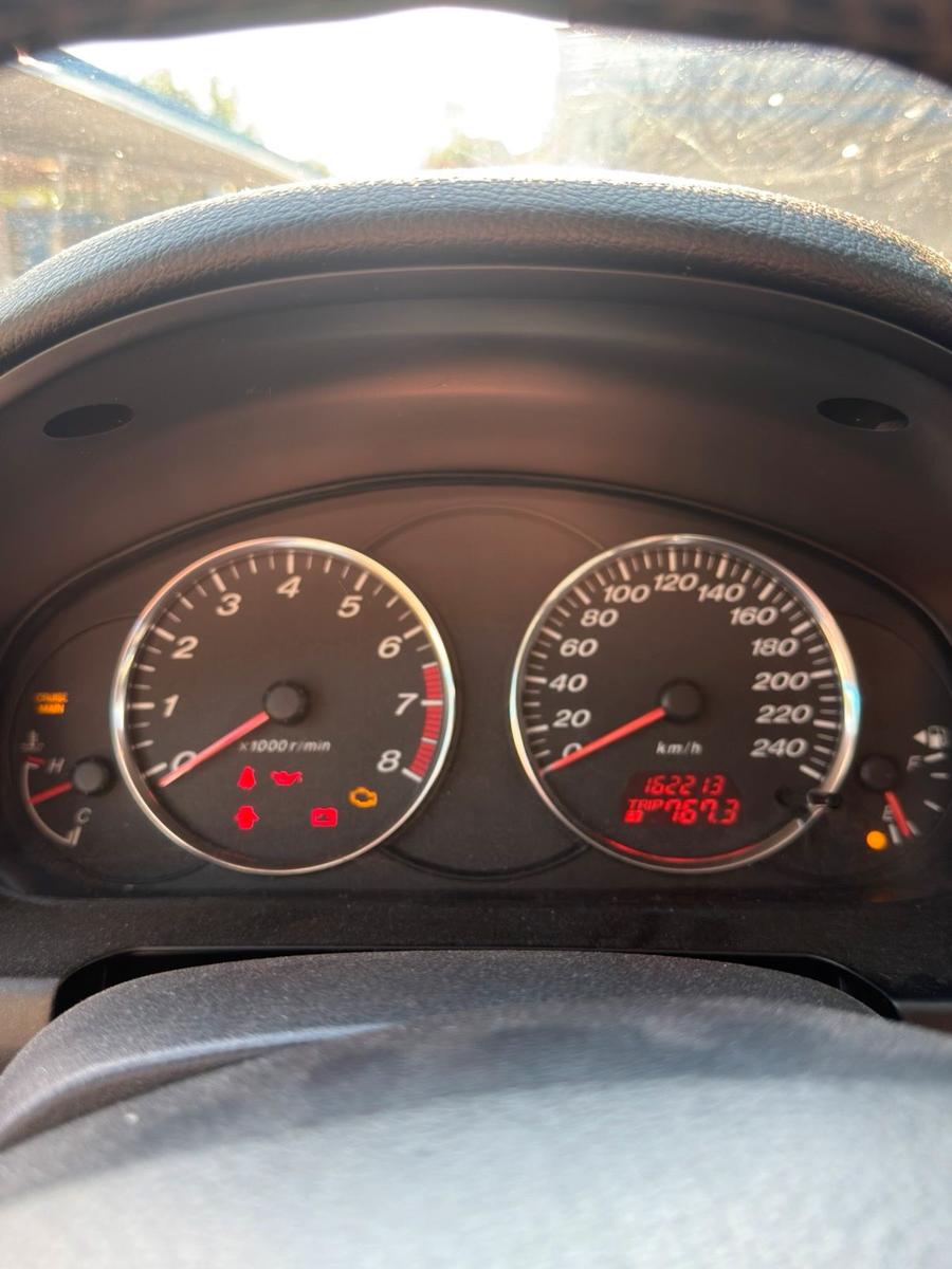 Mazda 2 2005 — photo 8