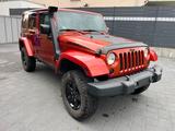 Jeep Wrangler Unlimited Sport 2.8 CRD Autom. Sport - Jeep Wrangler: Orange