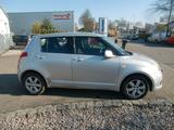 Suzuki Swift Lim. 4x4 Allrad/Klima/ALU/org. 125.841 km - silberne Suzuki Swift