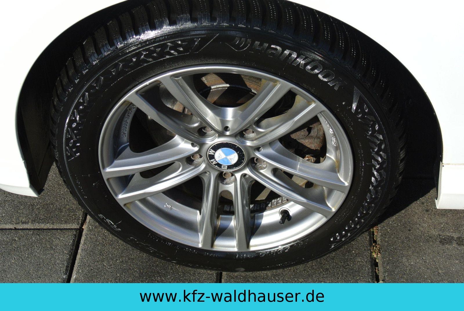 BMW 318 2010 — photo 20