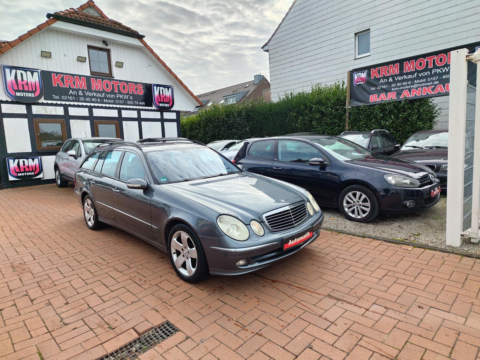 Mercedes-Benz E320 2005 — вигляд ззаду