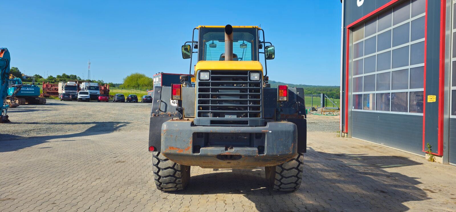 Fahrzeugabbildung Komatsu WA320-6 Schaufel +Gabel +Schnellwechsler/ 7.800