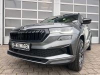 SKODA Karoq Sportline 2.0 TDI DSG 4x4 AHK MATRIX 5JGAR bei Autohaus Landmann & Maier OHG