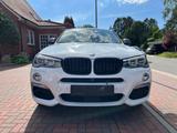 BMW X4 M40i - weiße BMW X4 M40
