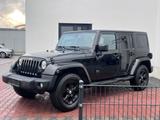 Jeep Wrangler Unlimited Sahara*NUR 140TKM*NAVI*BLACK* - Jeep Wrangler in Mainz