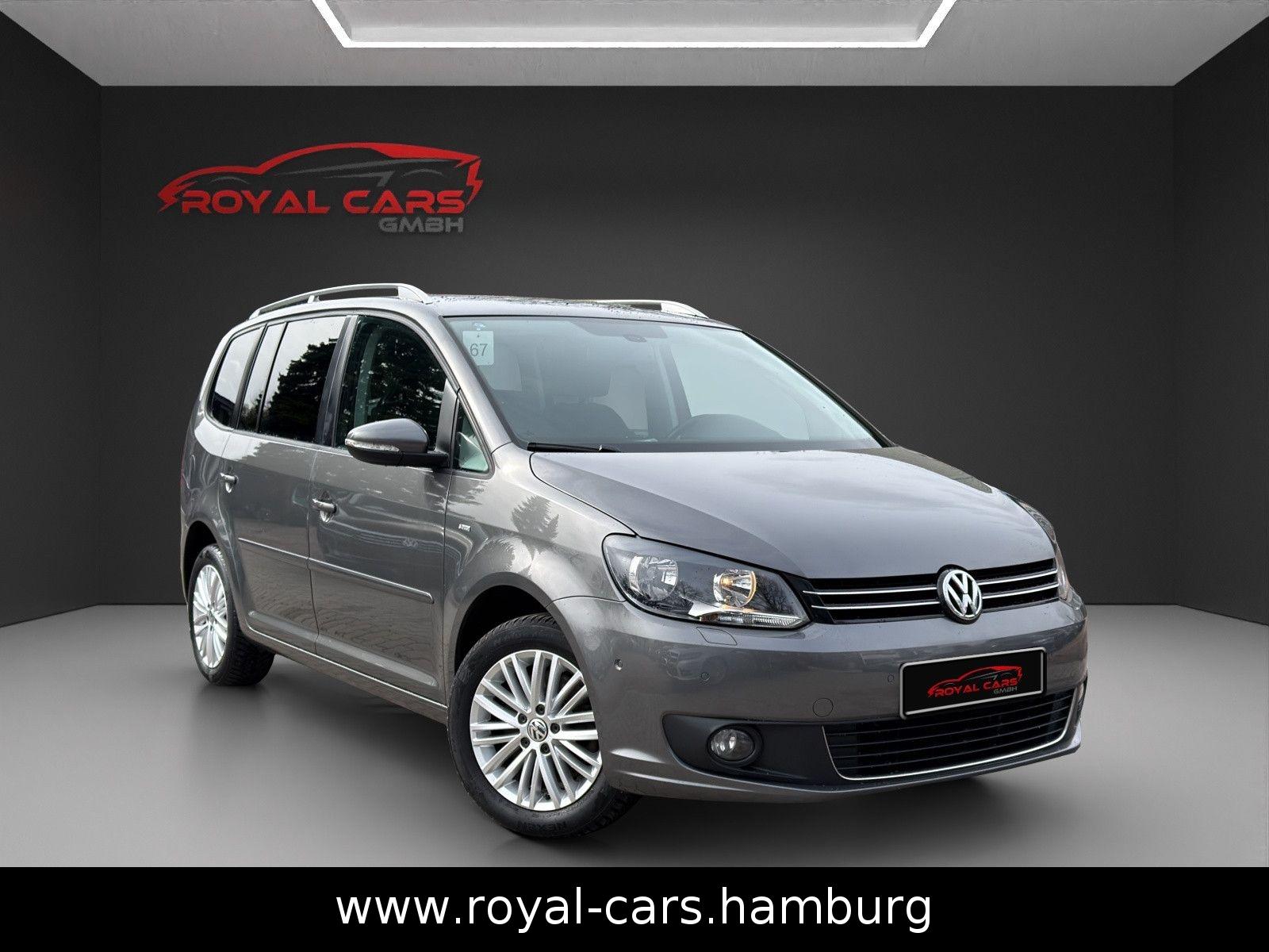 Volkswagen Touran Cup BMT NAVI*KLIMA*PDC*SHZ*7-Sitze*I.HAND