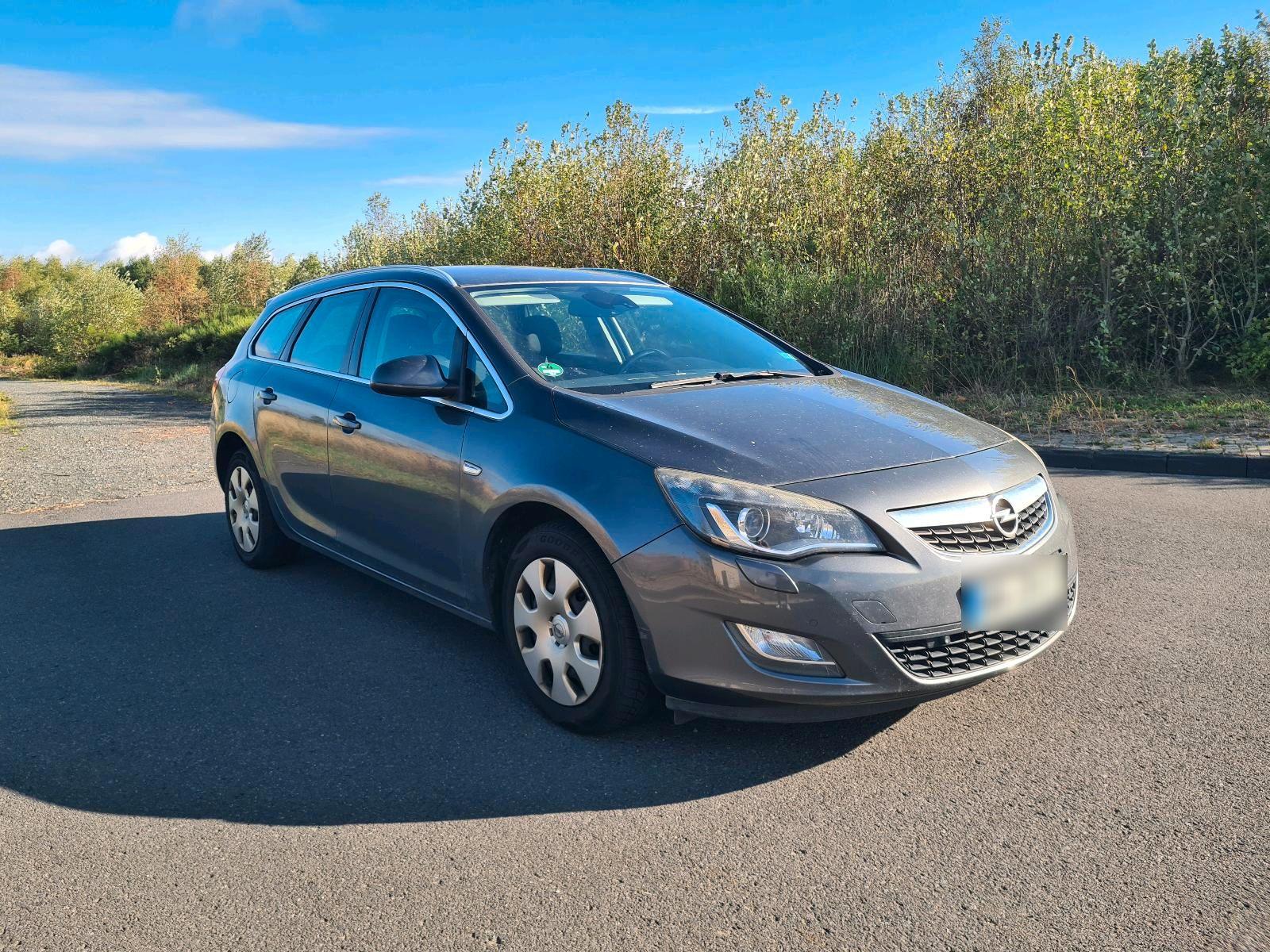 Opel Astra 2011 — engine 125 HP (92kW)