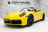 Porsche 992 Cabrio 3.0 Carrera 4S 450 PK | Sportuitlaat - mit Benzin-Antrieb: Gelb, Cabrio