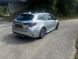Toyota Corolla 2,0 Hybrid Team Deutsch Touring Spor... - Toyota Corolla: Automatik