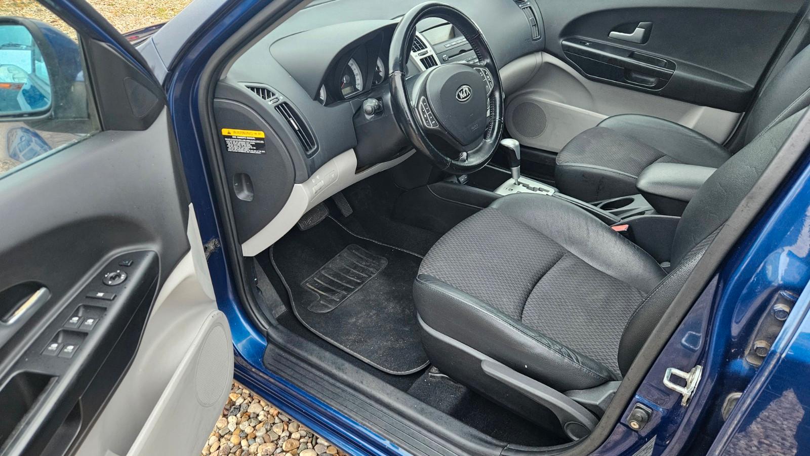 Kia cee'd 2009 — photo 11