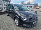 Volkswagen Touran 1.6 TDI Cup 7.Sitzer PDC MFL NAVI Sitzh. - Volkswagen Touran mit Diesel-Antrieb: Kleinbus, 1.6