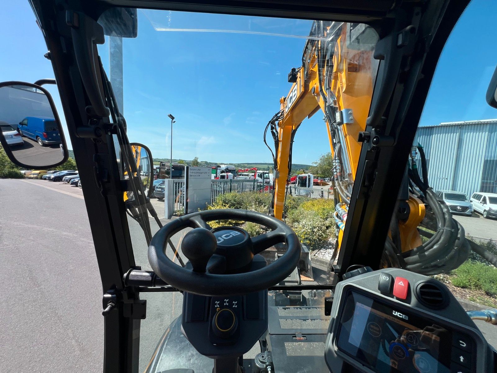 Fahrzeugabbildung JCB Hydradig 110W / Pratzen / nur 179h / Löffelpaket