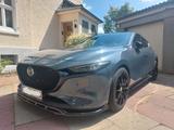 Mazda 3 2.0 SKYACTIV-X AWD M-Hybrid 179PS GrauBurgundy