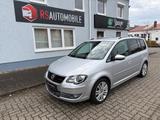 Volkswagen Touran Freestyle*Ahk*PDC*Sitzheizung*Navi*DSG - Volkswagen Touran Freestyle mit Benzin-Antrieb