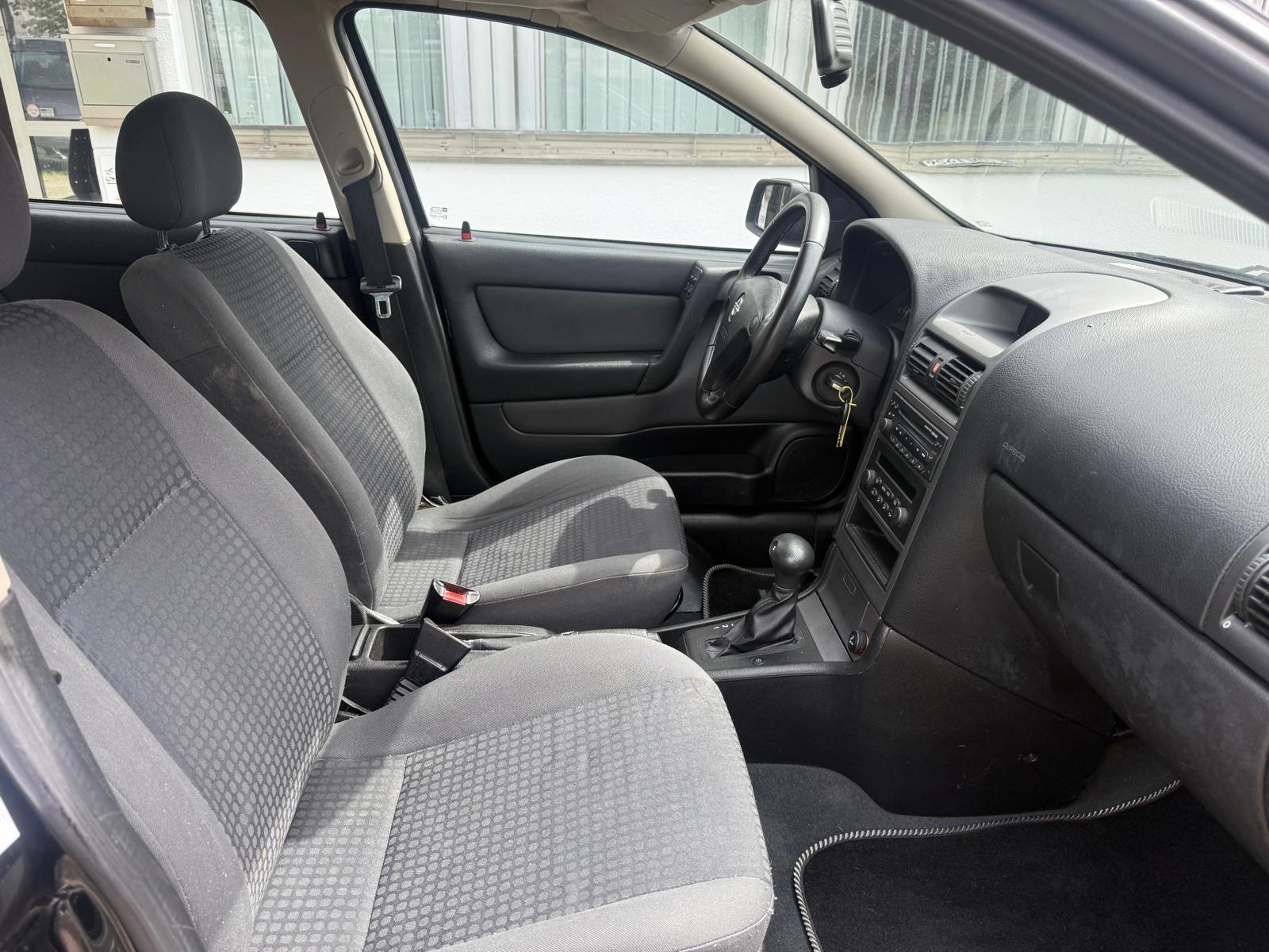 Opel Astra 2004 — photo 12